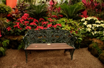 Memorial Bench in a flower garden