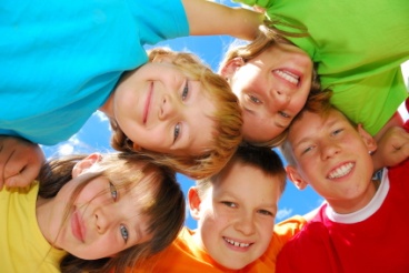 Five smiling happy kids