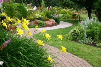 Winding path through a park with flowers