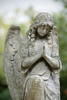 Angel of stone praying